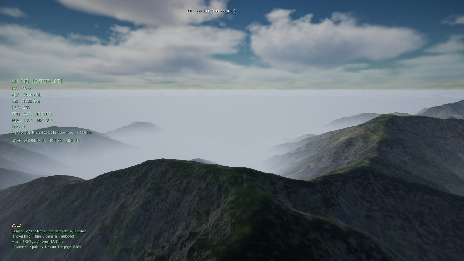 The Korengal valley at dawn from an Apache cockpit: cloud above, mist filling the valleys below, the ridge lines dark green.